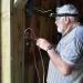 Garth wiring the driving shed