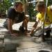 Dave and Dante installing patio stones at Harry's Cabin